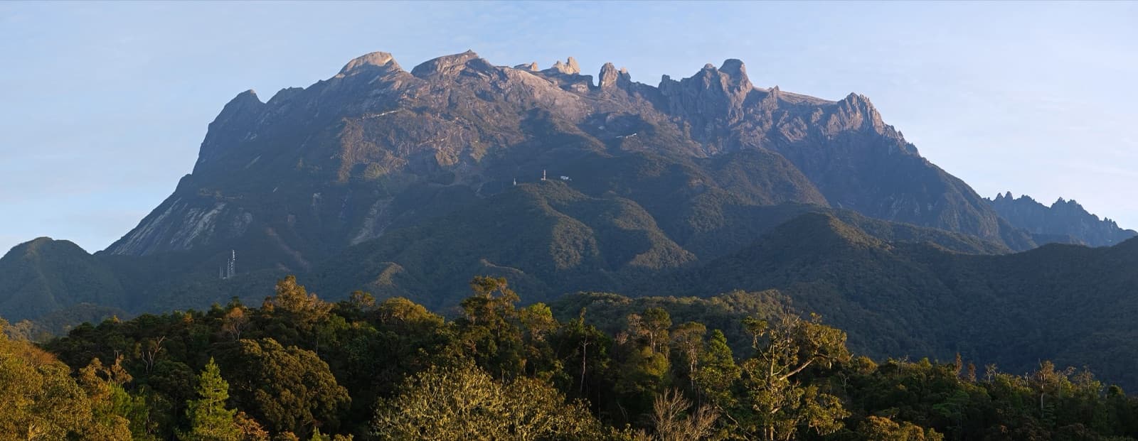The granite peaks of Mount Kinabalu in Borneo, rising above a sea of cloud