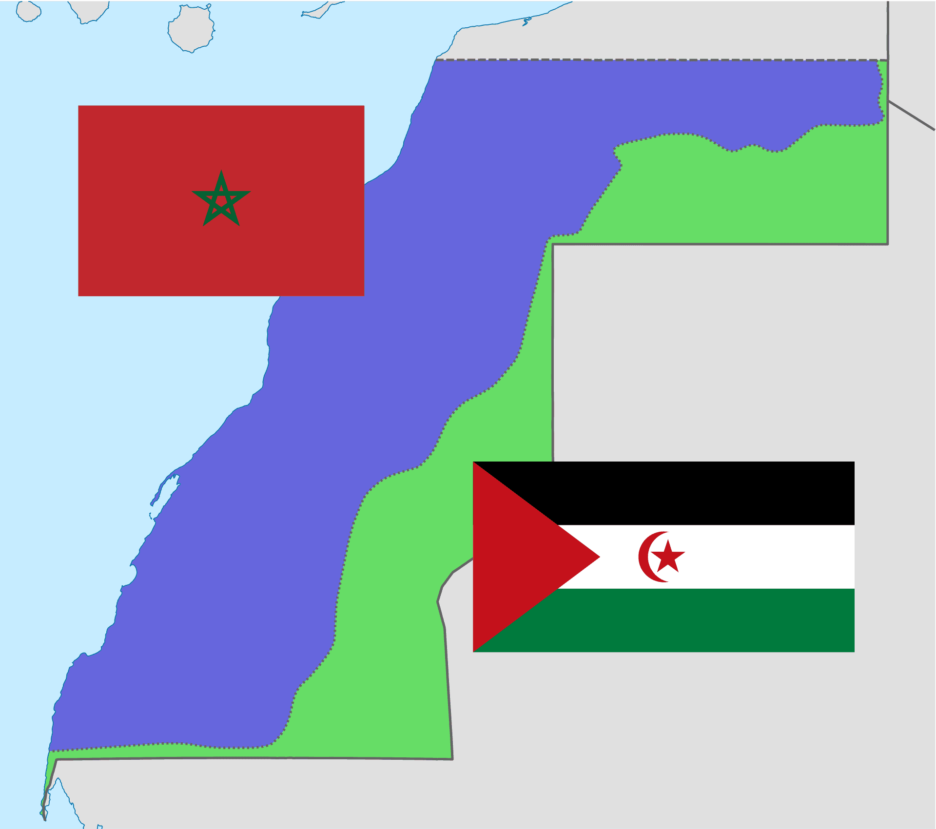 A dry riverbed winding through reddish desert landscape in Western Sahara