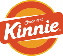 A bottle of Maltese Kinnie soft drink poured over ice